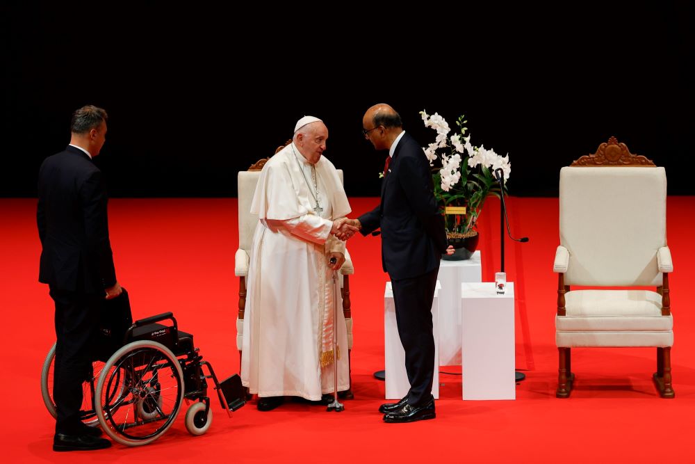 Pope Francis shakes hands with Singapore President Tharman Shanmugaratnam. Pope Francis shakes hands with Singapore President Tharman Shanmugaratnam.